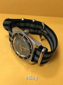 Authentic rare Vintage Swiss Made FESTIVA 20AM Manual Wind diver watch Black R4