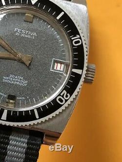 Authentic rare Vintage Swiss Made FESTIVA 20AM Manual Wind diver watch Black R4