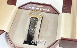 Rare Vintage Ladies Technos Swiss Made Gold Tone Stainless Steel Leather Watch