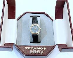 Rare Vintage Ladies Technos Swiss Made Gold Tone Stainless Steel Leather Watch