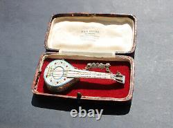 Rare Vintage Swiss Mandolin music box / silver brooch