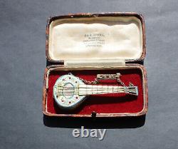 Rare Vintage Swiss Mandolin music box / silver brooch