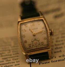 Rare vintage 1951 Bulova Swiss 7 jewel men's fancy case gold wristwatch, running