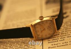 Rare vintage 1951 Bulova Swiss 7 jewel men's fancy case gold wristwatch, running
