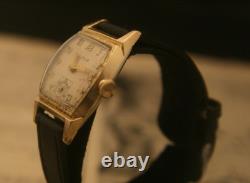 Rare vintage 1951 Bulova Swiss 7 jewel men's fancy case gold wristwatch, running