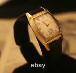 Rare vintage 1951 Bulova Swiss 7 jewel men's fancy case gold wristwatch, running