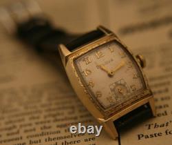 Rare vintage 1951 Bulova Swiss 7 jewel men's fancy case gold wristwatch, running