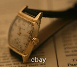 Rare vintage 1951 Bulova Swiss 7 jewel men's fancy case gold wristwatch, running