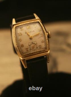 Rare vintage 1951 Bulova Swiss 7 jewel men's fancy case gold wristwatch, running