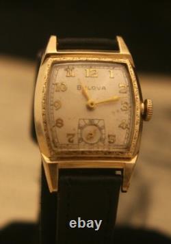 Rare vintage 1951 Bulova Swiss 7 jewel men's fancy case gold wristwatch, running