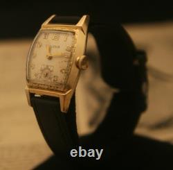 Rare vintage 1951 Bulova Swiss 7 jewel men's fancy case gold wristwatch, running