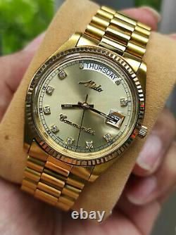 Rare vintage Mido Commander Day Date Mido 8299 Gold Plated authentic swiss made