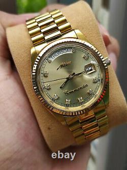 Rare vintage Mido Commander Day Date Mido 8299 Gold Plated authentic swiss made