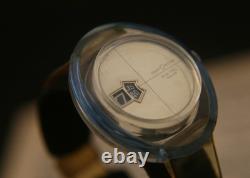 Rare vintage Swiss CUSTOMTIME jump hour turquoise and amber acrylic wristwatch