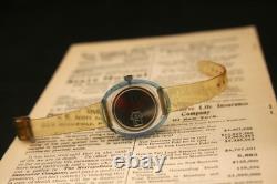 Rare vintage Swiss CUSTOMTIME jump hour turquoise and amber acrylic wristwatch