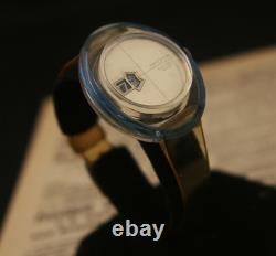 Rare vintage Swiss CUSTOMTIME jump hour turquoise and amber acrylic wristwatch