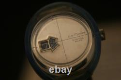 Rare vintage Swiss CUSTOMTIME jump hour turquoise and amber acrylic wristwatch