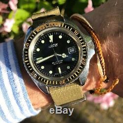 Rare vintage swiss Uno monnin 844 200m military divers watch bakelite bezel