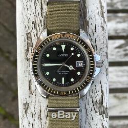 Rare vintage swiss Uno monnin 844 200m military divers watch bakelite bezel