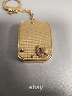 Vintage Swiss Reuge Musical Pendant Keychain Rare Works & Plays