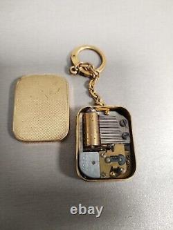 Vintage Swiss Reuge Musical Pendant Keychain Rare Works & Plays