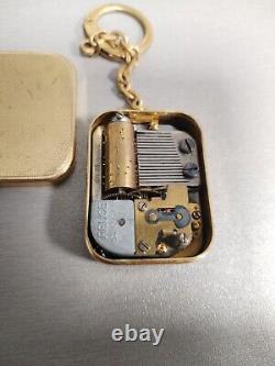 Vintage Swiss Reuge Musical Pendant Keychain Rare Works & Plays